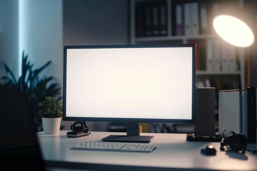 Computer Mockup on a White Desk with Tech Gadgets and Various Electronic Components photo