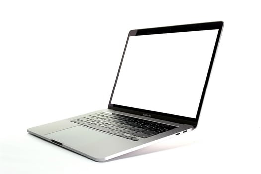 Laptop Mockup with Blank Screen on White Desk Ideal for Business Presentations photo