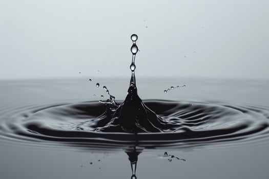 Water Droplet Creating Ripples on White Surface   Background Nature photo