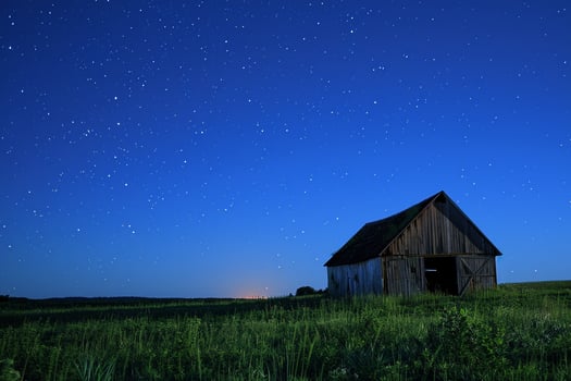 Barn in Meadow with Starry Night and  Sky photo