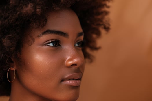 Natural Hair African Woman Portrait with Earthy Brown Tone photo