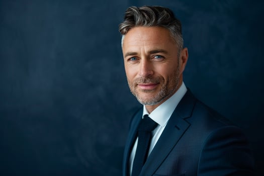 Head of a businessman in a classic navy Background projecting confidence photo