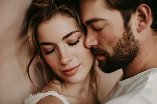 Intimate couple portrait pastel background tender expressions photo