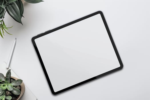 Tablet Screen Mockup on Gray Desk Background photo