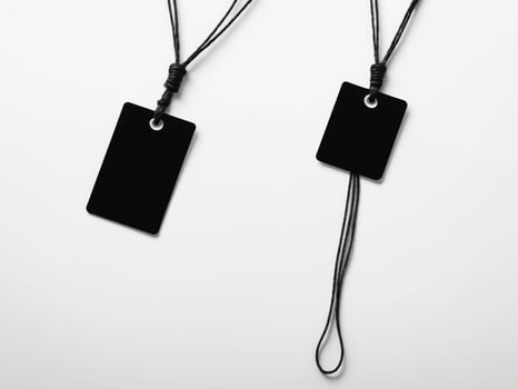 Black Paper Price Label With String Isolated on white background. photo