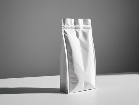 White paper doypack placed on podium on empty background. photo