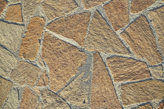 Rock masonry, seamless textured surface. Road material or floor material with space to copy photo