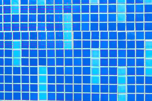 Texture of blue mosaic tiles, close-up photo