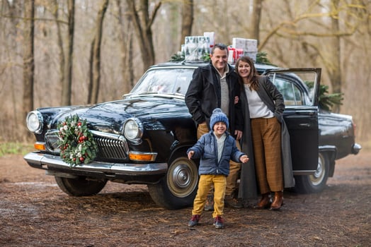 Stylish couple with son in park. Holiday concept photo