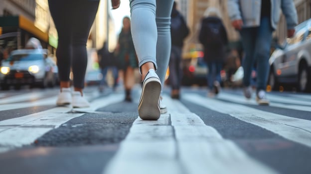 People legs crossing the pedestrian crossing in New York city photo