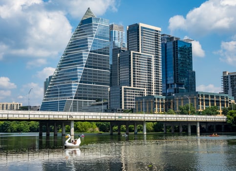 Modern apartment buildings and offices by the Colorado River in cityscape skyline of Austin Texas photo