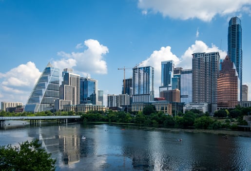 Modern apartment buildings and offices by the Colorado River in cityscape skyline of Austin Texas photo