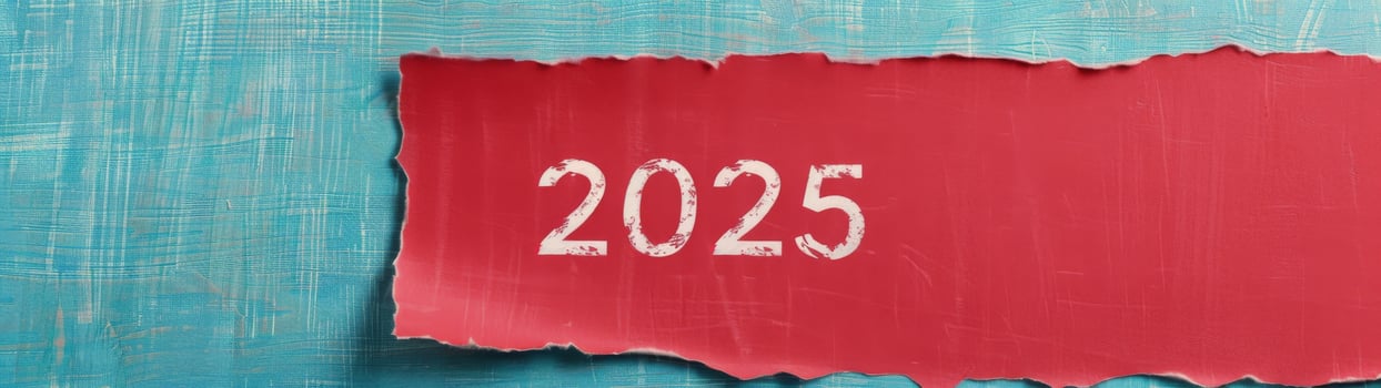 Torn Paper Reveal of 2025 on Textured Blue Background photo
