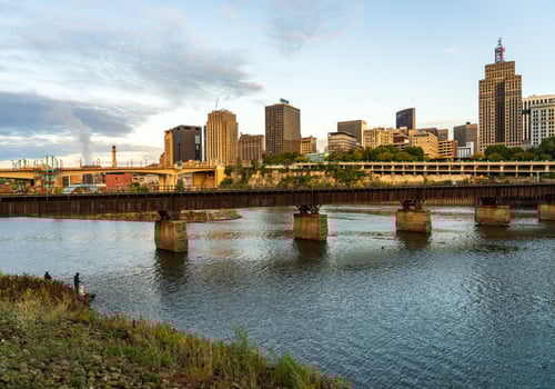 St Paul, MN - 14 October 2023. Early morning cityscape of Twin Cities in Minnesota and Mississippi river with railroad bridge photo