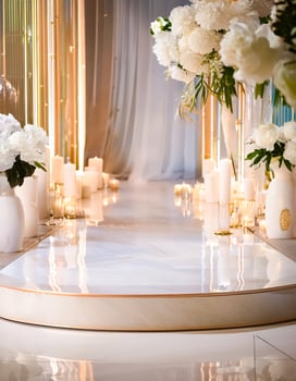 Elegant Wedding Ceremony Setup with White Flowers and Candles photo