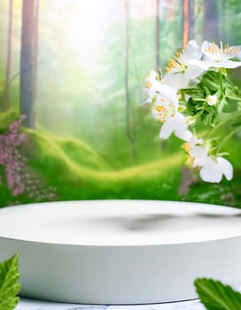 White Podium With Spring Flowers and Blurred Forest Background photo