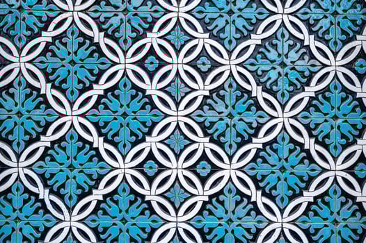 tile mosaic with traditional oriental Arabic Islamic Uzbek pattern decorated with blue and white ornament photo