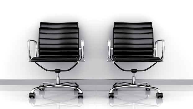 Two Ergonomic Office Chairs. Modern Workspace, Professional Setting, Comfortable Seating. photo