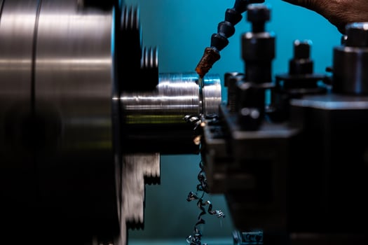 The CNC lathe machine thread cutting at the end of metal cone shape parts The hi technology metal working processing by CNC turning machine photo