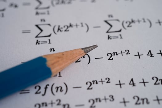 Pencil on mathematic formula exercise test paper in education school. photo