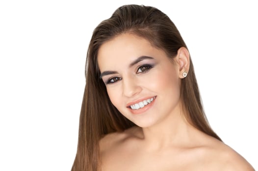 Beautiful smiling young woman with perfect clear skin and long hair photo