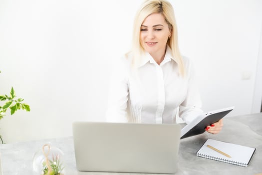 Businesswoman with Digital Tablet in Office, woman holding tablet photo
