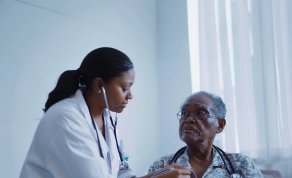 Female doctor examining an elderly patient with a stethoscope in a clinical setting.Generated image photo
