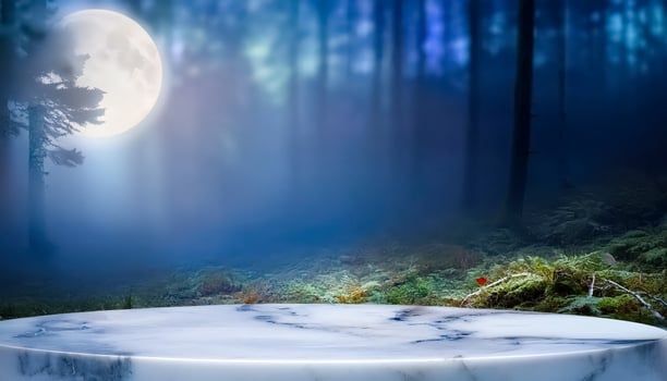 Marble podium with forest and moon backdrop photo