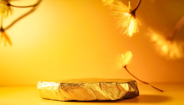 Golden Stone Podium with Yellow Background and Bokeh Flowers photo