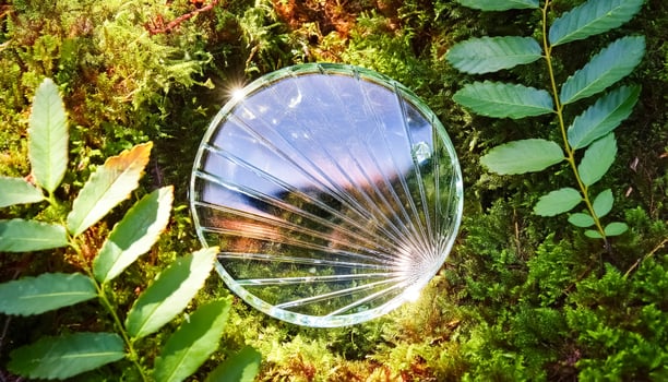 Sunbeams through a cracked glass lens photo