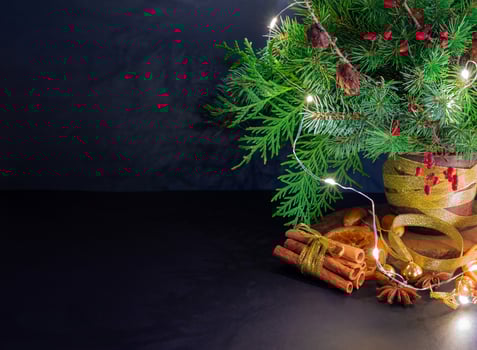 A small decorated Christmas tree for Christmas and New Year photo