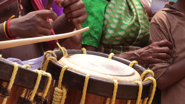 Artists playing Chenda, a South Indian traditional musical instrument photo