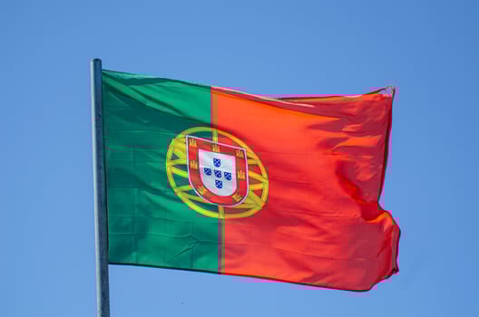 Portugal flag blowing in the wind photo