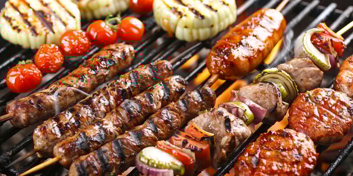 Colorful Vegetable and Meat Skewers on Barbecue Grill photo