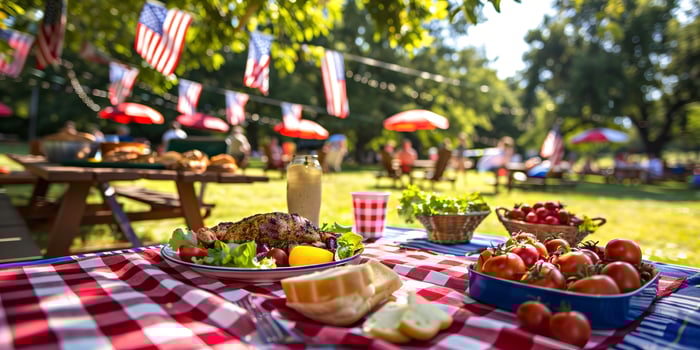 Memorial Day picnic table with food and American flags photo