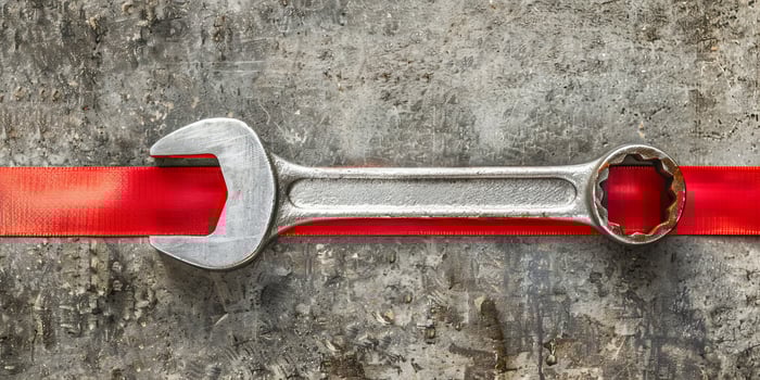 Labor Day Symbol Wrench with Red Ribbon photo