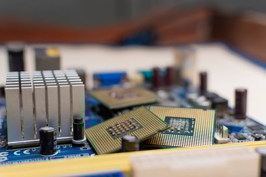 Close up of a motherboard, details of a computer motherboard, detail of a motherboard socket, three processors on a computer motherboard photo