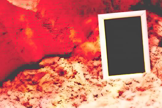 Pale frame with place for text on red sand background photo