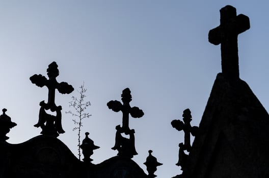 Cross silhouettes in a catholic cemetery photo