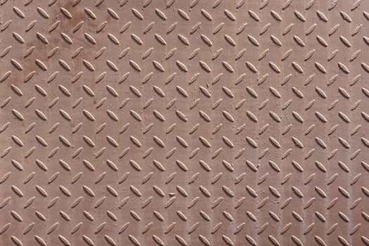 Corrugated metal surface with diamond plate texture. The diamond steel metal sheet. Pattern of old metal diamond plate photo