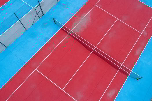 A tennis courts from an aerial view photo