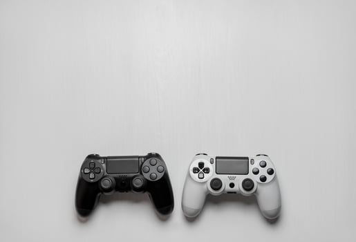 Black and white gamepad on white background. photo