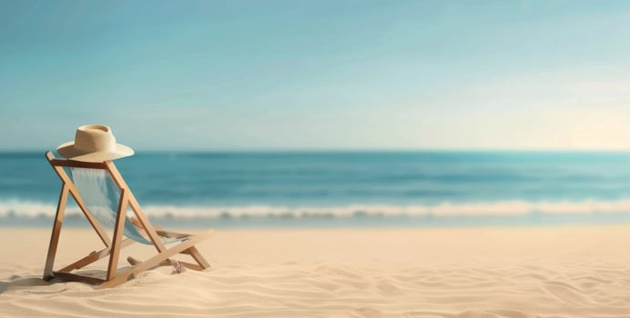 Relaxing Beach Chair With Straw Hat by the Ocean on a Sunny Day photo