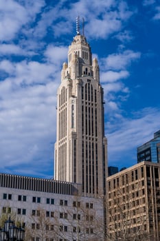 Ornate Art Deco LeVeque tower stands tall above the Columbus Ohio skyline photo