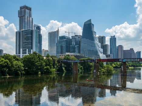 Austin, TX - 15 June 2023. Modern apartment buildings and offices by the Colorado River in cityscape skyline of Austin Texas photo