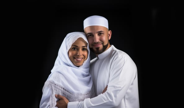 Portrait of a Muslim couple in white Ihram garments at a sacred site, reflecting their devotion and unity during pilgrimage.Generated image photo