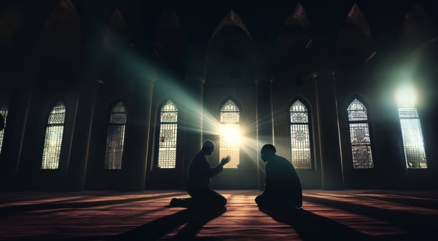Silhouettes of a Muslim man and woman praying at a sacred site, bathed in the golden light of sunrise and sunset.Generated image photo