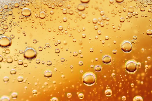 Beer banner with a close-up of beer bubbles and space for text. photo