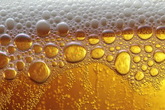 Beer banner with a close-up of beer bubbles and space for text. photo