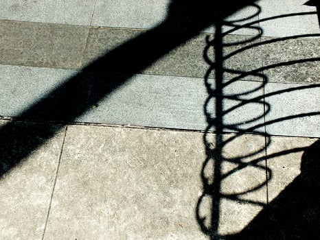 abstract background textured of a random shadow on an pavement pedestrian. photo